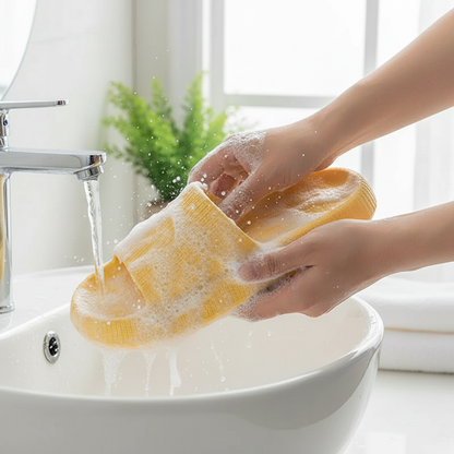 Yellow sandal being washed with foam